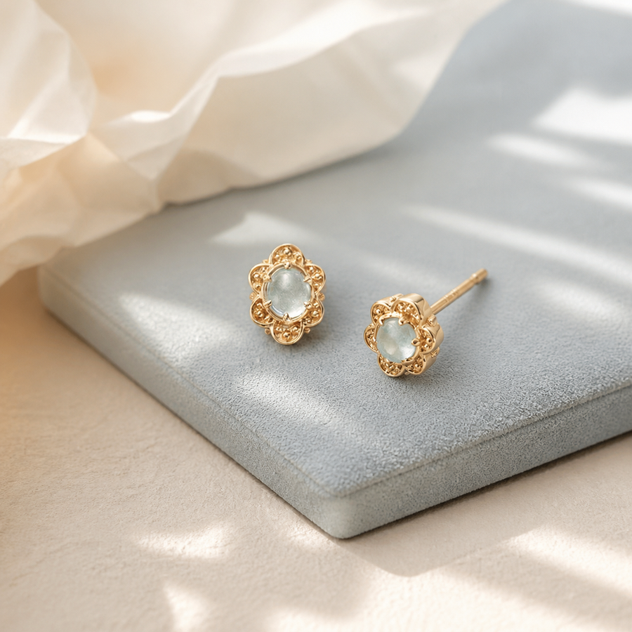 Mist petal stud earrings with pale blue center stones