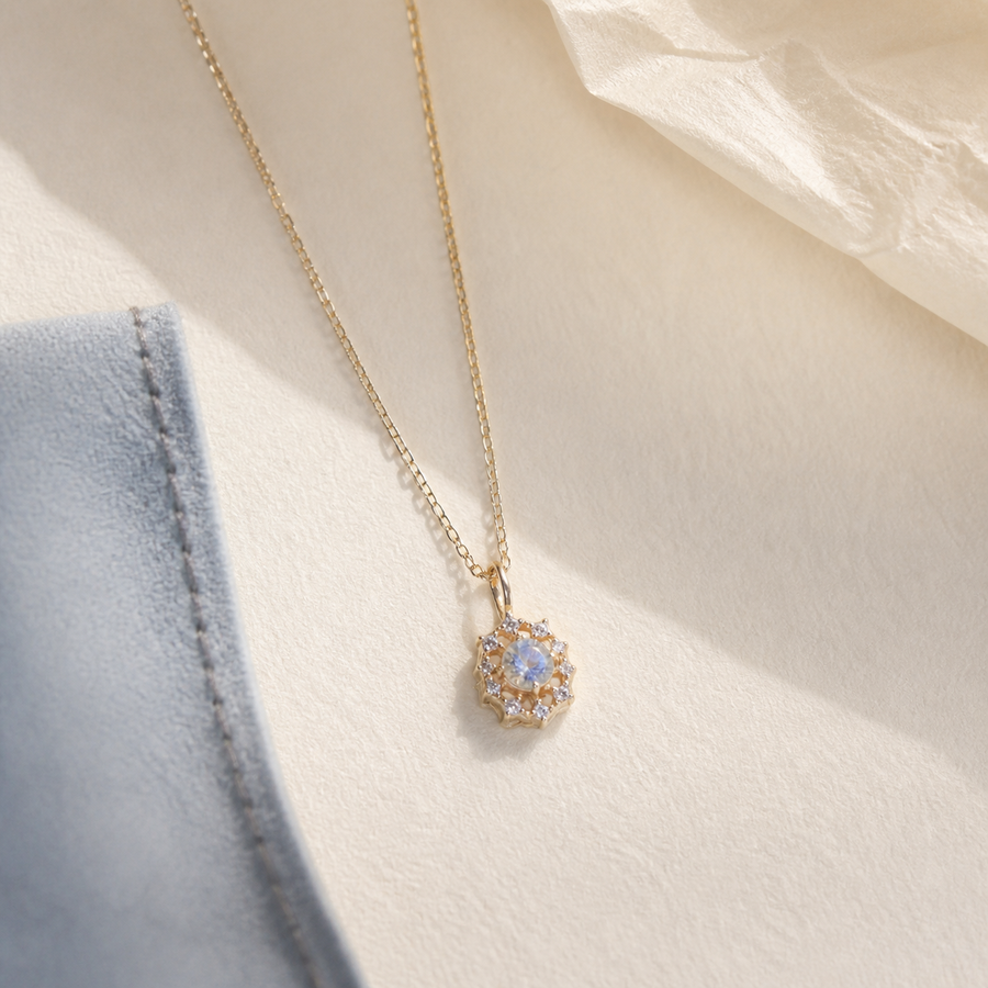 Star opal pendant necklace with pale blue stone