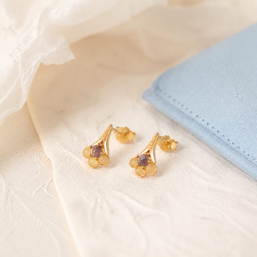 Violet tulip stud earrings on lace fabric